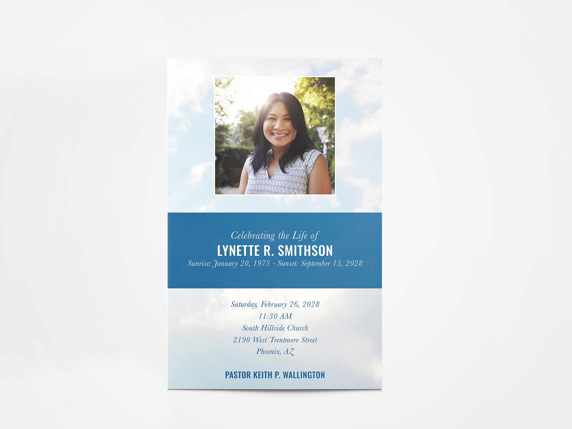 Airy clouds in a light blue sky.